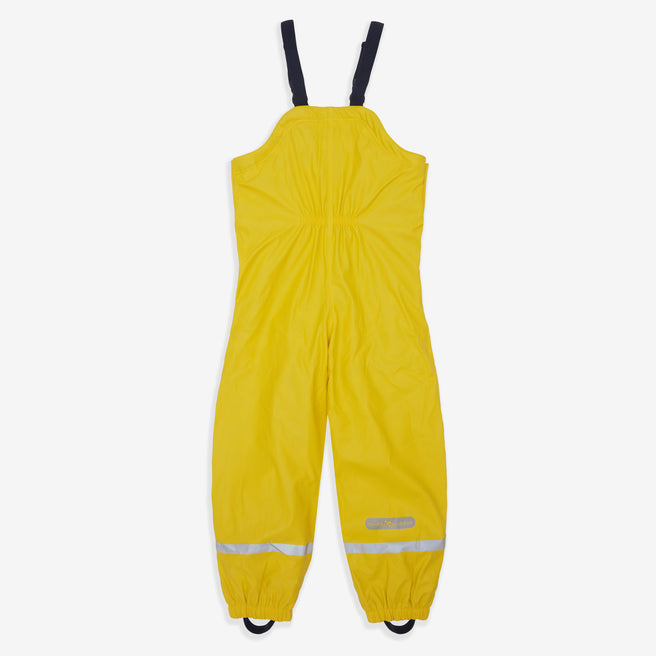 Yellow Muddy Puddles Puddleflex waterproof fleece lined dungarees on a white background, featuring black adjustable straps.